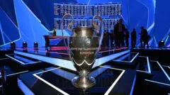 Champions League trophy at the draw