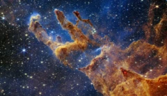 ภาพใหม่ของ “เสาแห่งการก่อกำเนิด” (The Pillars of Creation) ซึ่งบันทึกโดยกล้อง JWST