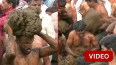 ஒருவர் மீது ஒருவர் சாணம் வீசிக்கொள்ளும் காட்சி 