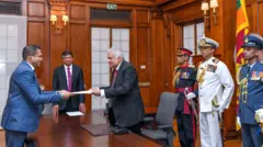 Harin Fernando being sworn in