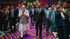 ቀዳማይ ሚኒስትር ሞዲ ምስ ኢትዮጵያዊ መዘንኡ ኣብዪ ኣሕመድ