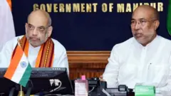 केंद्रीय गृहमंत्री अमित शहा आणि एन बिरेन सिंह 