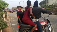 Okada and Police officer - 03/02/20