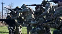 військові