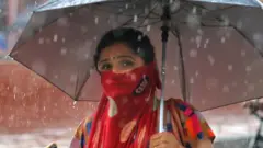 મહિલા