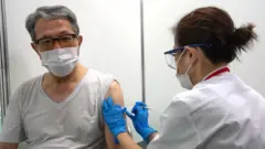 Patient getting vaccine injection