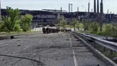 A picture released by the Russian Defence Ministry which it claims show Ukrainian soldiers who have surrendered at the Azovstal steelworks