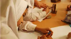 طالبة محجبة
