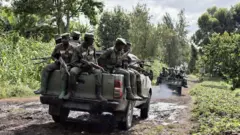 Inyeshyamba za M23 ziva mu kigo cya gisirikare cya Rumangabo, nyuma yo kugirana inama n'abategetsi b'umutwe w'ingabo z'akarere k'Afurika y'uburasirazuba, muri DR Congo. Ifoto yo ku itariki ya 6 Mutarama (1) mu 2023