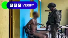 An IDF soldier interrogates a detainee in Gaza