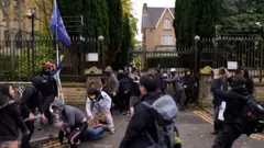中國駐曼徹斯特總領事館外發生抗議者遭攻擊事件