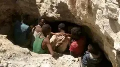 በቁፋሮ ላይ ያሉ ሰዎች