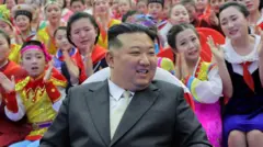 2024년 1월 2일 조선중앙통신이 공개한 사진에서 김정은 북한 국무위원장이 새해를 맞아 평양에서 학생들과 함께한 행사에 참석하고 있다