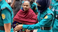 সাকিনা বেগমকে নিয়ে যাচ্ছে পুলিশ