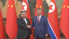 习近平金正恩六年来首会，称友谊“永不变”、提及台湾问题