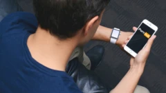 Man on smartphone with pornhub logo