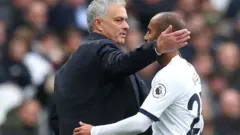 Jose Mourinho and Lucas Moura dey hug each oda afta dem sub am during di EPL match between West Ham and Tottenham