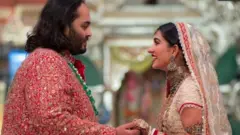 Anant Ambani and his wife Radhika Merchant during the ceremony in Mumbai