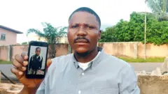 O﻿scar Chigemezu ji foto nwa ya bụ Chinedu onye ọ na-achọ achọ