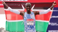 Runner Kelvin Kiptum after breaking Eliud Kipchoge's marathon world record in Chicago