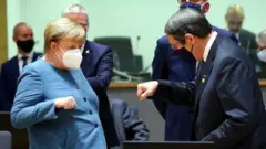 Merkel ve Kıbrıs Cumhurbaşkanı Nikos Anastasiadis,