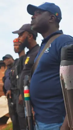 Vigilantes standing at alert