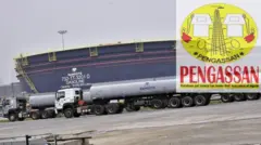 Picture of Dangote Refinery with branded trucks wey dey parked and Pengassan logo for di top right corner 