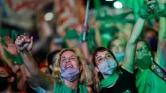 Demonstrators in favour of legalizing abortion attend a rally as the senate debates an abortion bill, in Buenos Aires, Argentina, December 30, 2020.