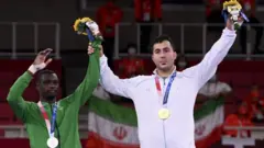 سجاد گنج زاده از ایران مدال طلا گرفت و طارق حامدی، از عربستان سعودی مدال نقره گرفت