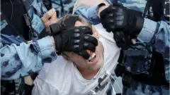 Police and protesters in Moscow, 27 July