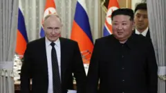 Путін і Кім