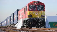 The first freight train from China to the UK arrives in London, having crossed seven countries in 18 days.