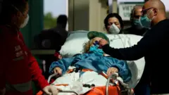 Patient arrives at Tor Vergata Covid hospital in Rome on 6 May