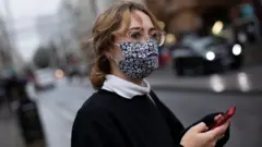 Woman in a facemask