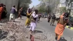 Taliban firing into the air