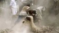 People search in Yemen's capital Sanaa following an overnight Saudi-led air strike