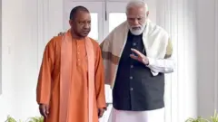 योगी आदित्यनाथ और नरेंद्र मोदी