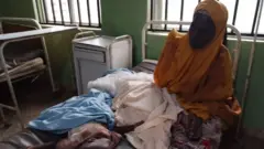 Èèyàn tó wà lórí ibùsùn ní ilé ìwòsàn