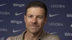 Xabi Alonso smiles being presented as Chelsea manager