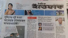 ই