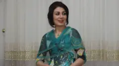 پخشان عزیزی، مددکار اجتماعی 