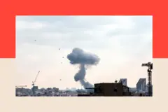 Humo en el fondo y el perfil urbano de los edificios de Tel Aviv.
