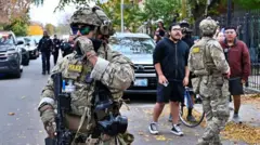 Image shoes ICE agents in Chicago