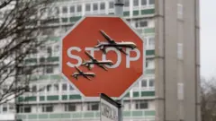 banksy stop