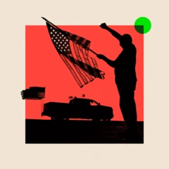 Hoton wani mutum riƙe da tutar Amurka a wajen taron tunawa da Charlie Kirk 
