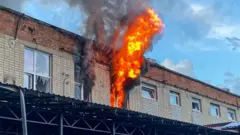 Пожар в доме в Чугуево Харьковской области после атаки российского дрона, 21 мая 2026 г.