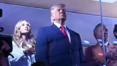 Trump kuri uyu mukino yari yaherekejwe n'umwuzukuru we Kai Trump