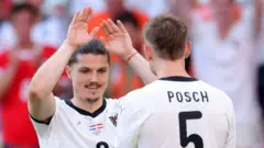 Ralf Rangnick lead Austria to top Group D