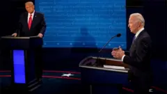 Democratic presidential candidate former Vice-President Joe Biden answers a question as US President Donald Trump