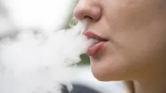 Close-up of a person vaping